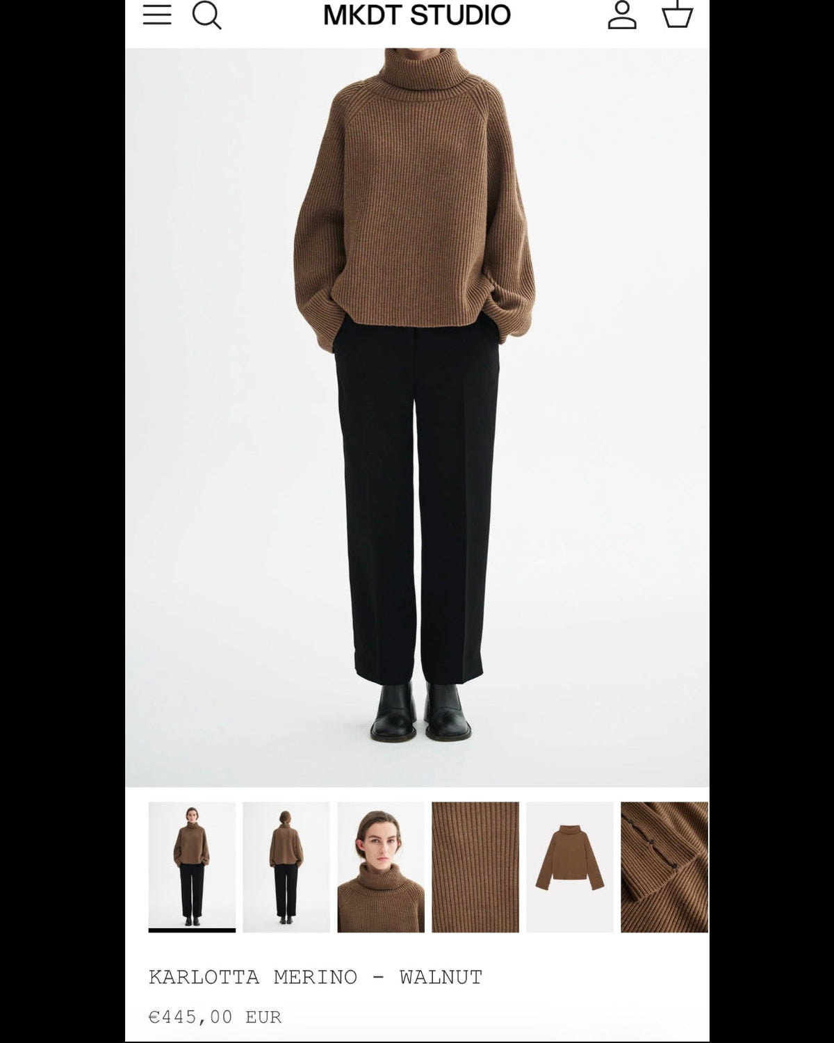 Black chunky merino wool turtleneck sweater by MKDT Studio