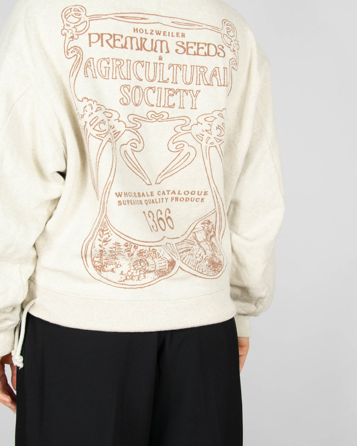 Beige hoodie made from organic cotton and hemp by Norwegian designer brand Holzweiler. The regular price is 3500 NOK (~1370 PLN). Made in Portugal.