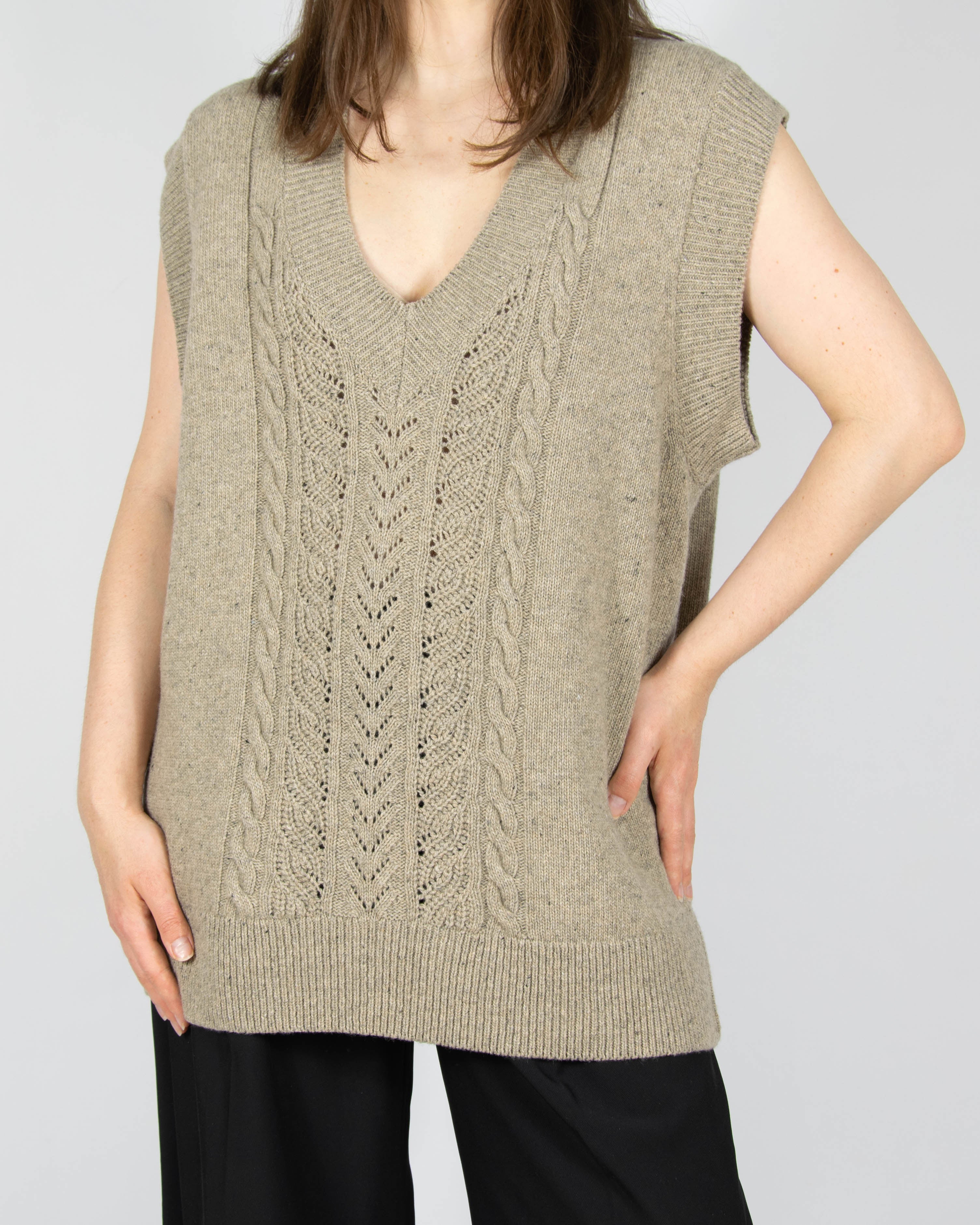 Beige open-knit wool vest by premium brand Baukjen