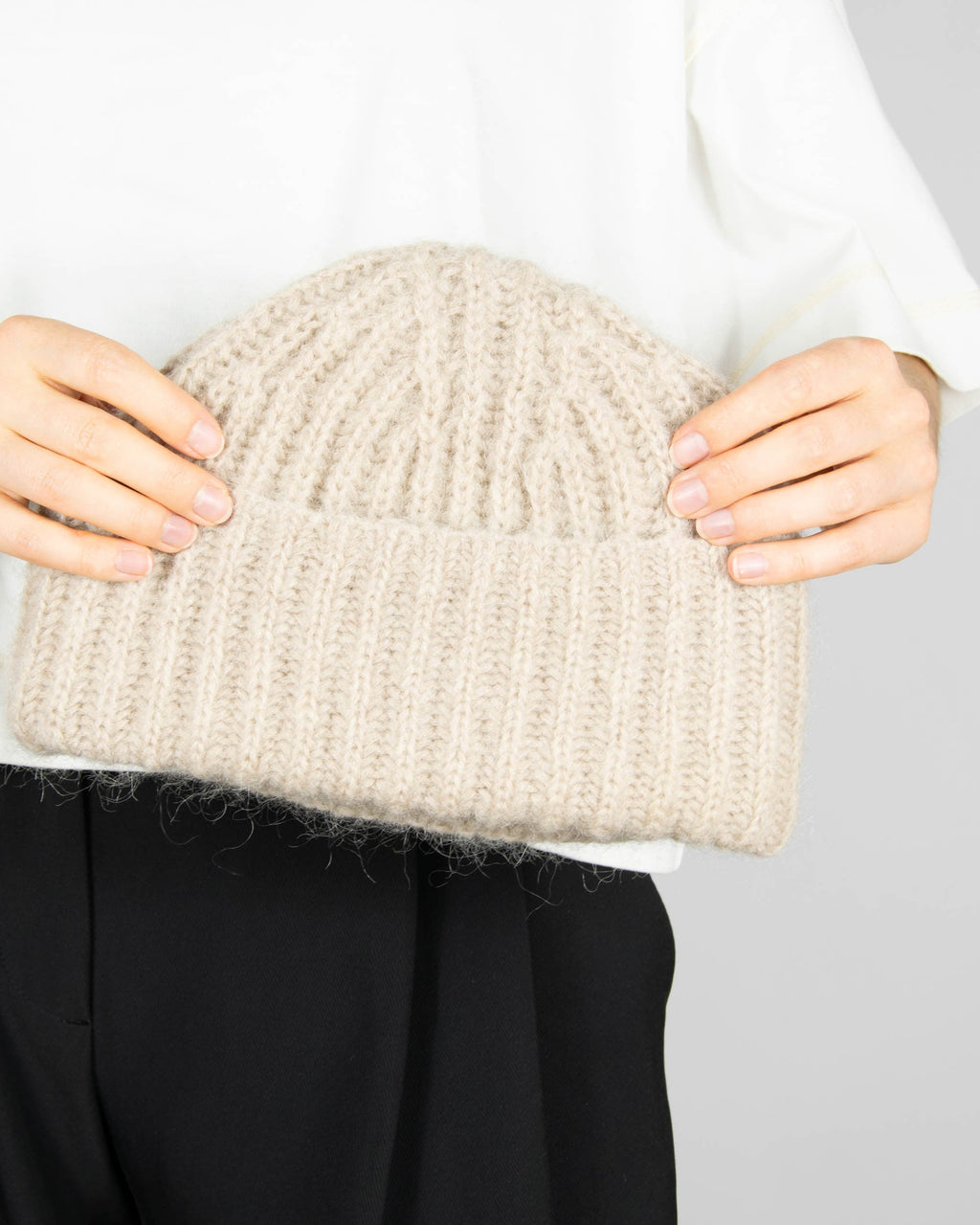 Beige super alpaca and merino wool hat by premium brand CAMILLA PIHL.