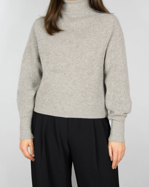 Beige cashmere turtleneck sweater by & Other Stories. The regular price on the brand's website is 790 PLN.