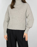 Beige cashmere turtleneck sweater by & Other Stories. The regular price on the brand's website is 790 PLN.