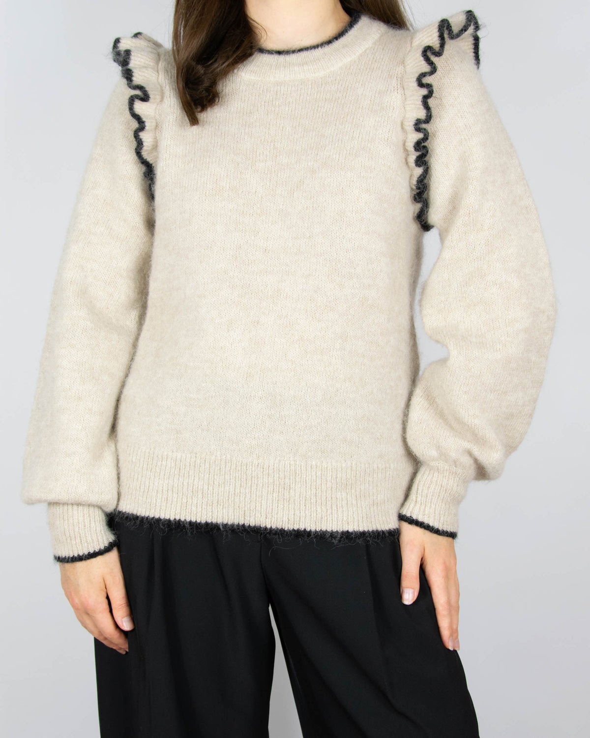Beige wool and alpaca sweater with ruffle details by Scandinavian brand Selected.