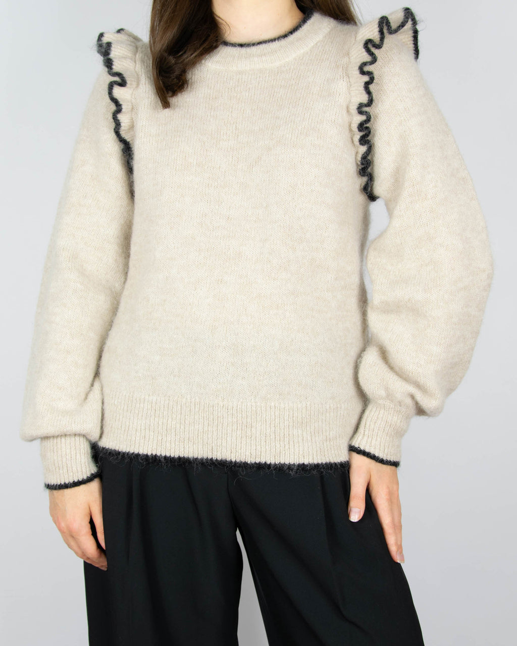 Beige wool and alpaca sweater with ruffle details by Scandinavian brand Selected.