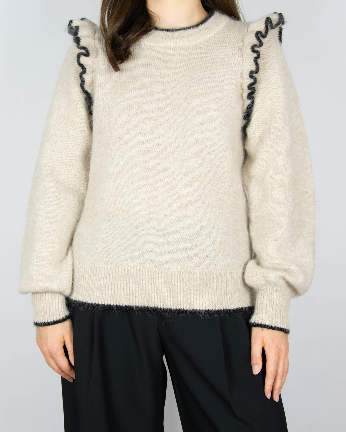 Beige wool and alpaca sweater with ruffle details by Scandinavian brand Selected.