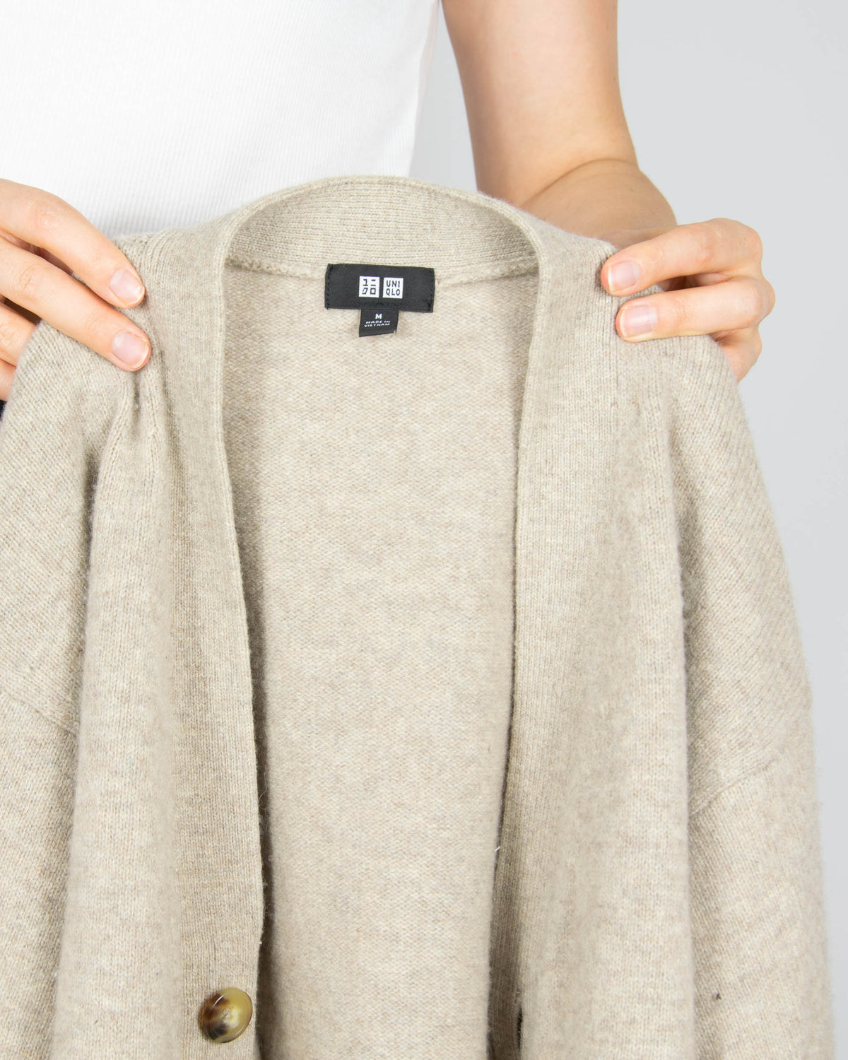 Beige wool cardigan by Uniqlo