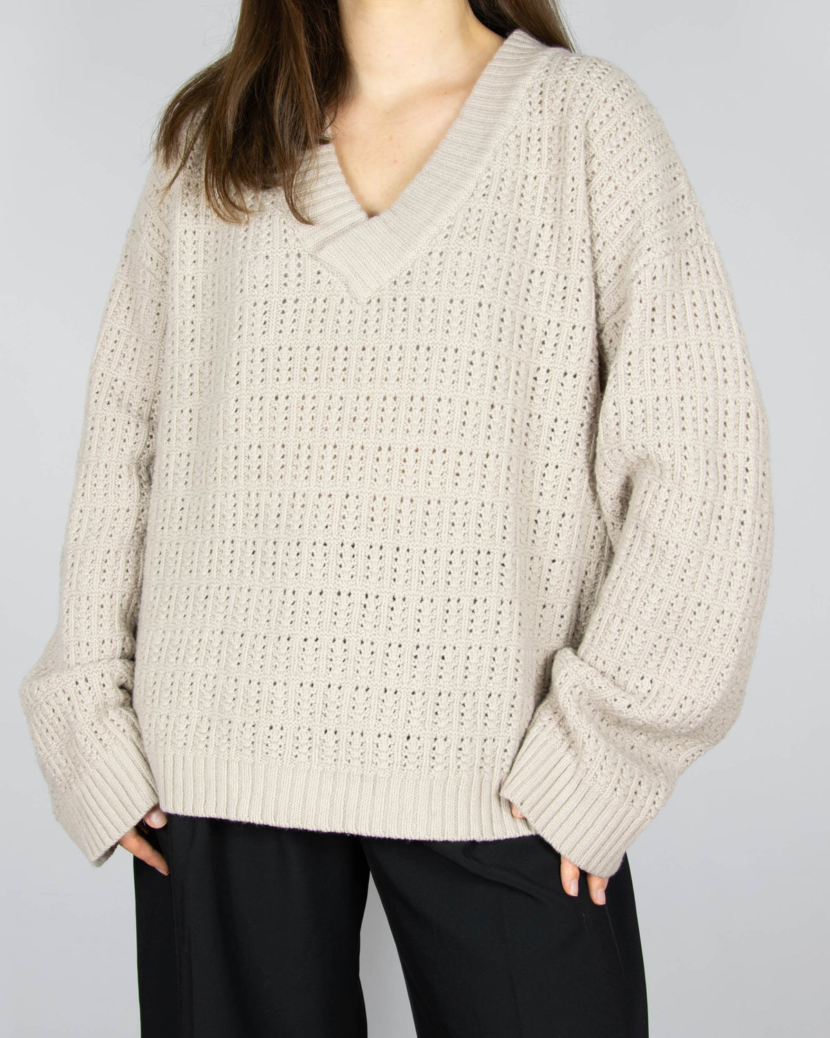 Beige open-knit wool sweater by Boii Studios