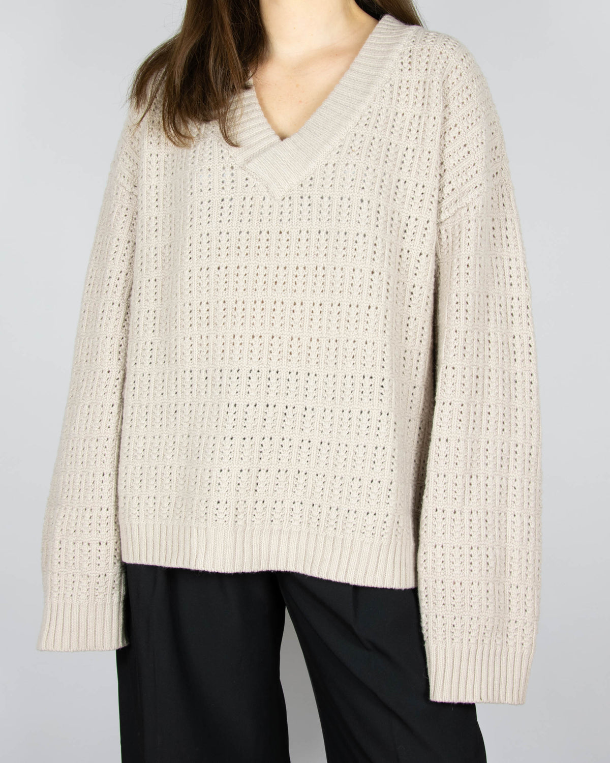 Beige open-knit wool sweater by Boii Studios