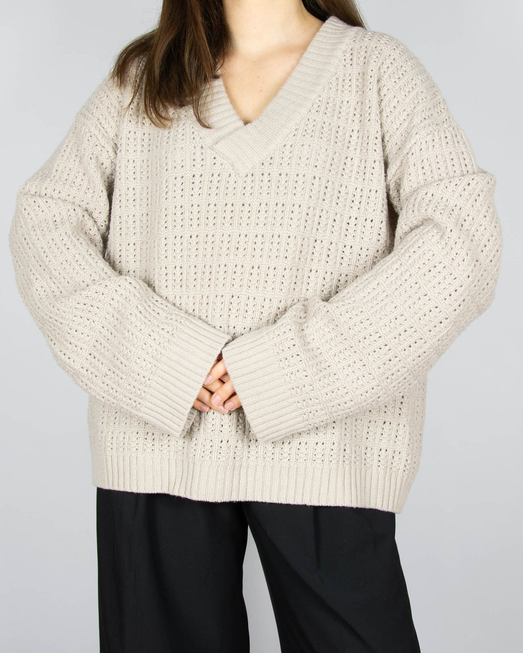 Beige open-knit wool sweater by Boii Studios