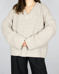 Beige open-knit wool sweater by Boii Studios
