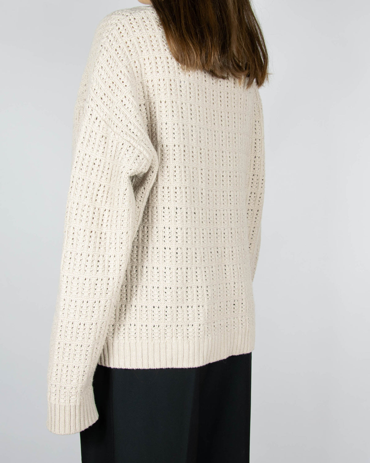 Beige open-knit wool sweater by Boii Studios