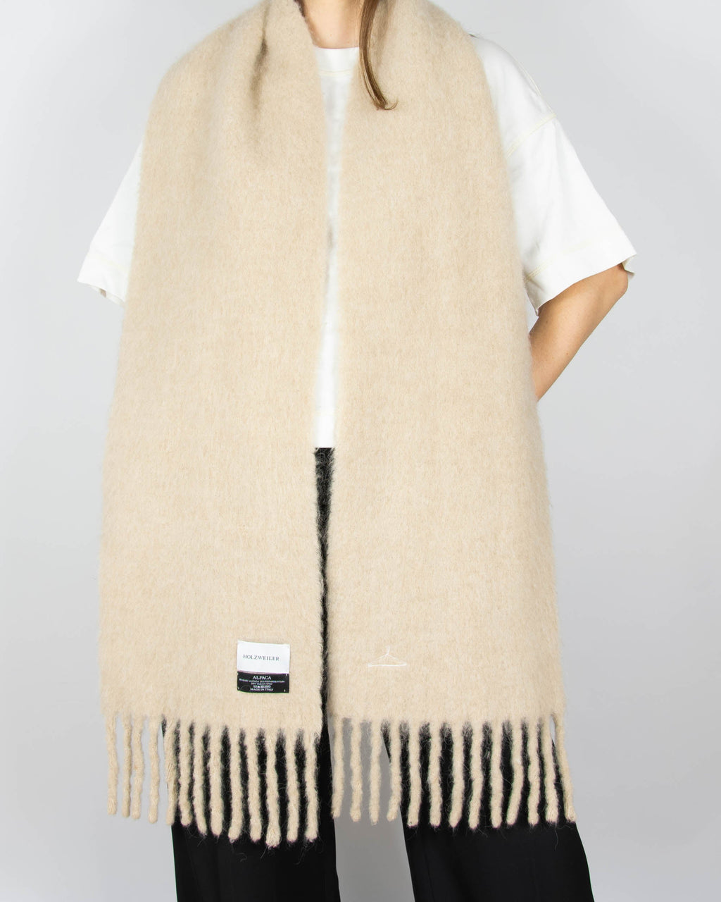 Cream baby alpaca scarf by Holzweiler