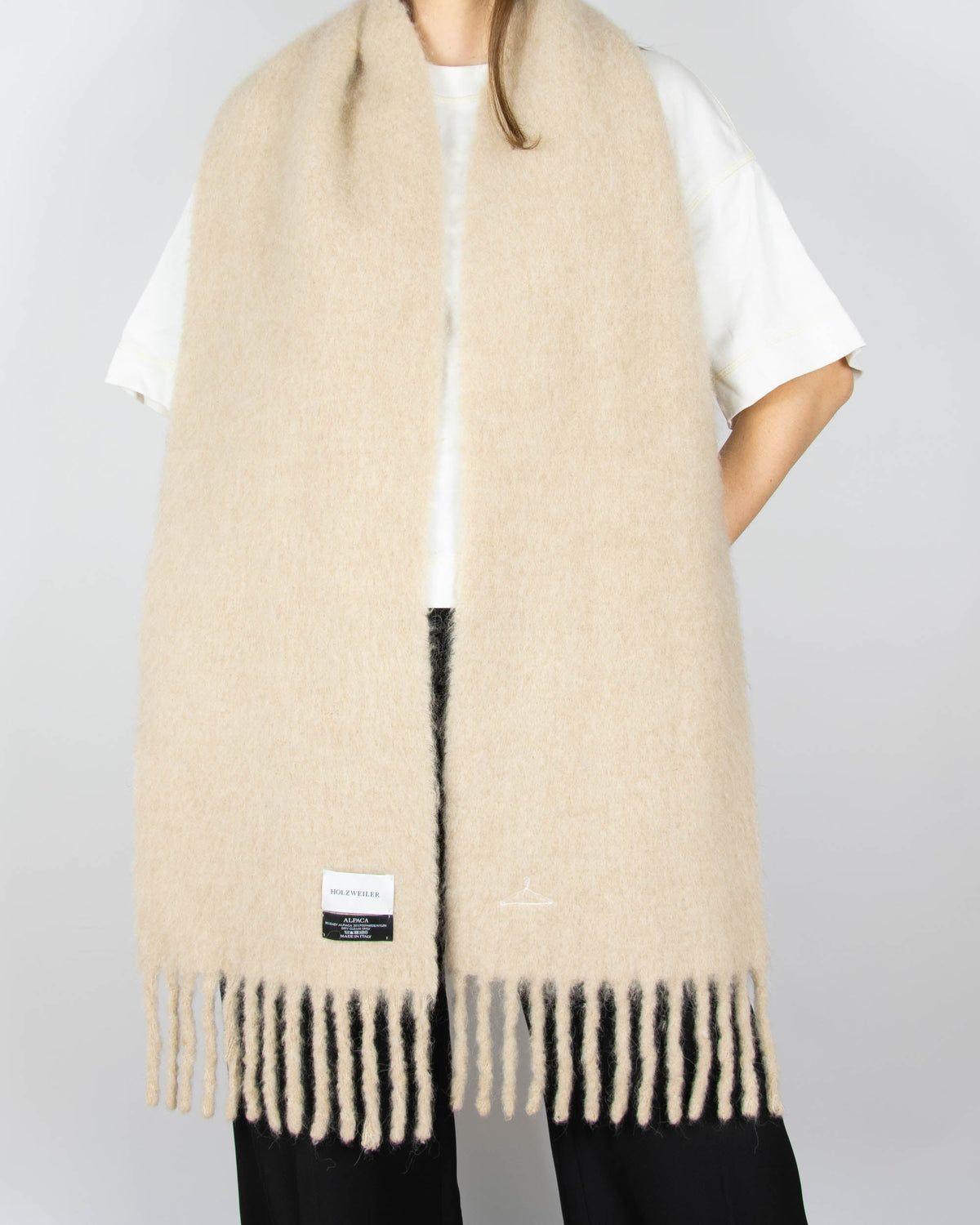 Cream baby alpaca scarf by Holzweiler