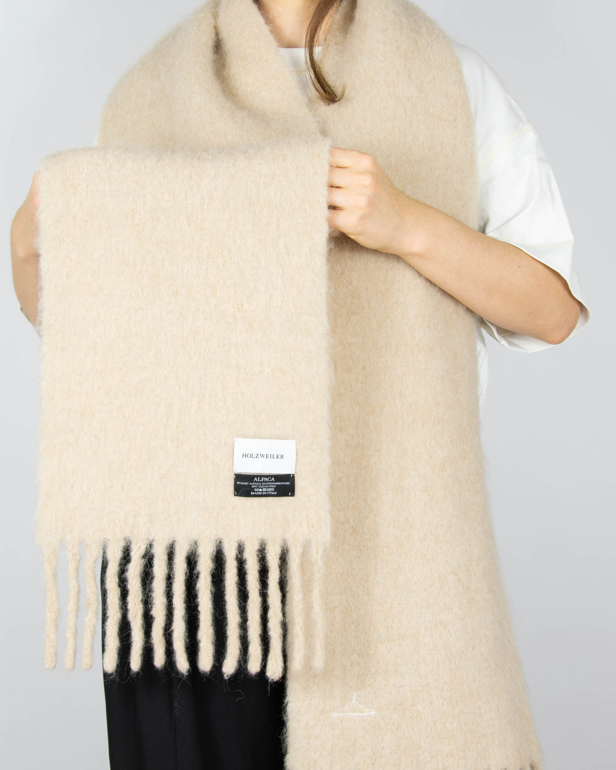 Cream baby alpaca scarf by Holzweiler