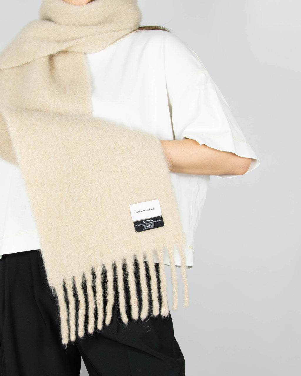 Cream baby alpaca scarf by Holzweiler
