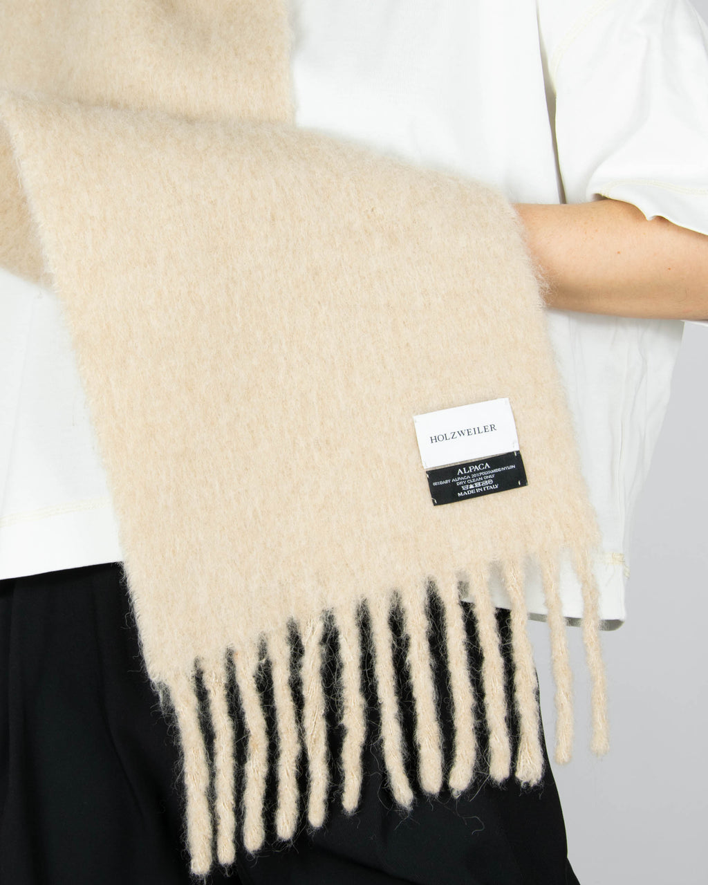 Cream baby alpaca scarf by Holzweiler