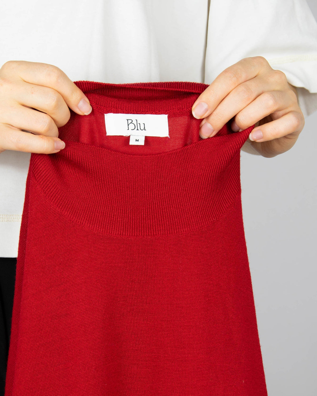 Red merino wool turtleneck sweater by Blu