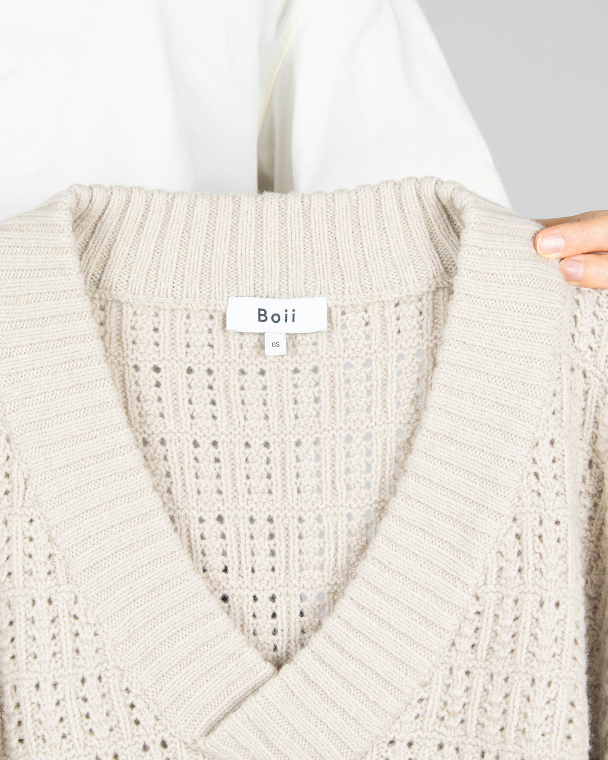 Beige open-knit wool sweater by Boii Studios