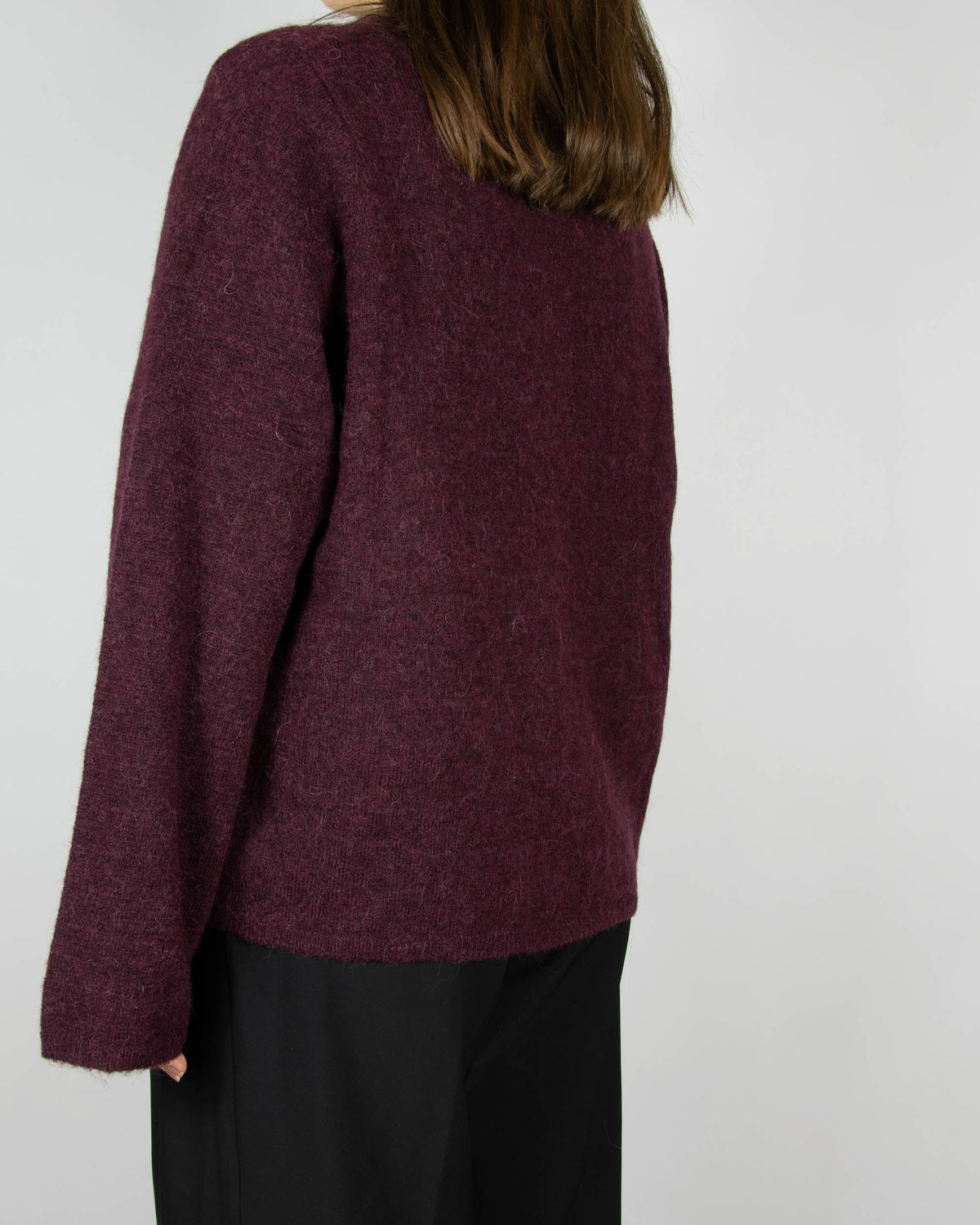 Burgundy wool and alpaca cardigan by Scandinavian brand Selected. The price on the tag is 330 PLN.