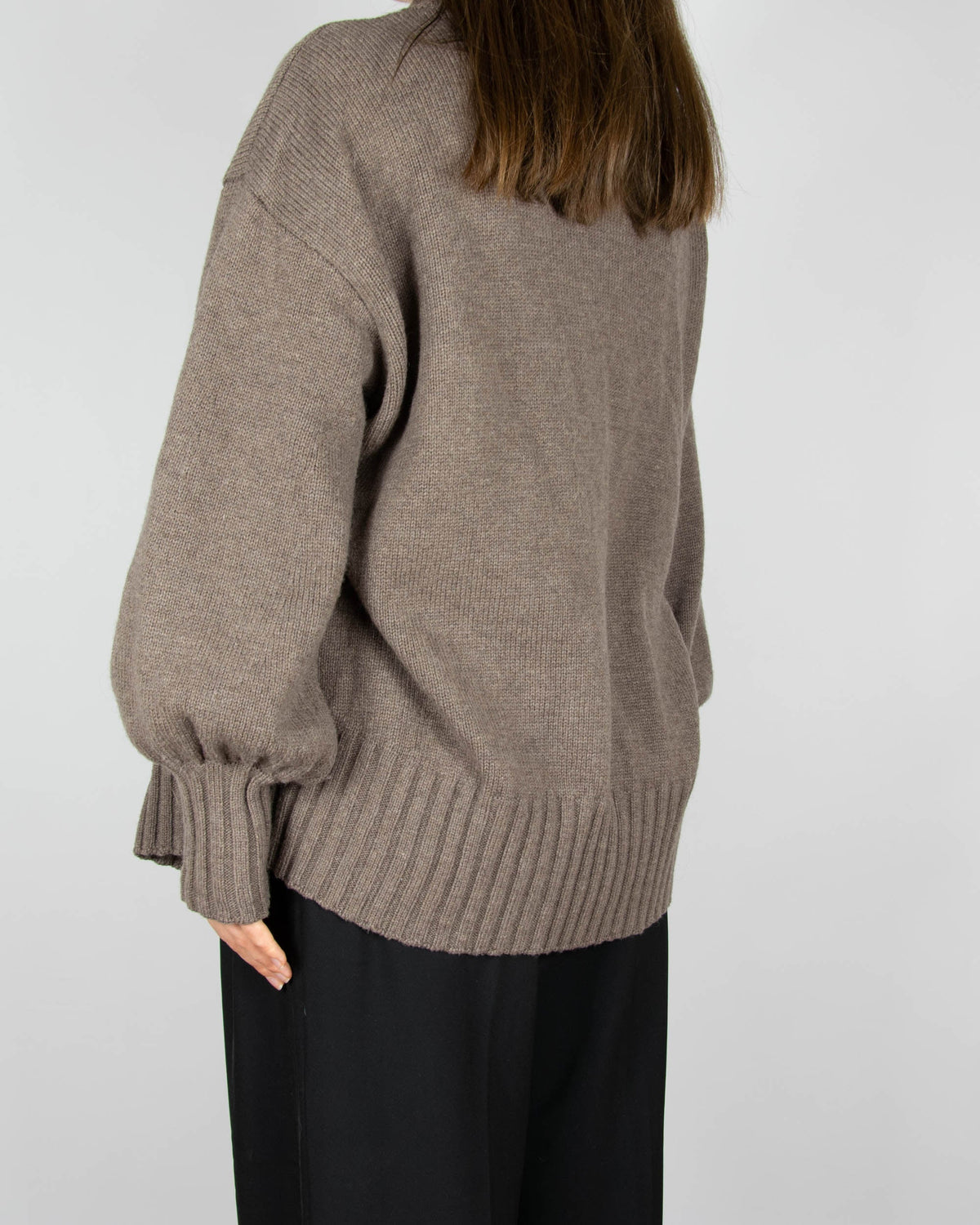 Brown tie-front merino wool cardigan by Scandinavian brand Pierre Robert.