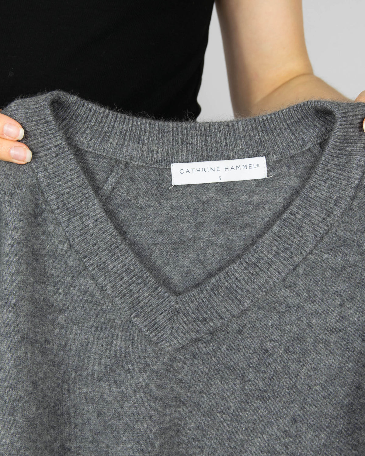 Grey raccoon hair and wool sweater by Cathrine Hammel