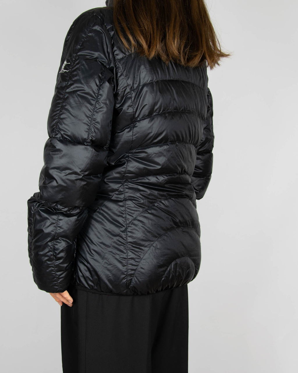 Black women's down jacket by Norwegian brand BERGANS OF NORWAY