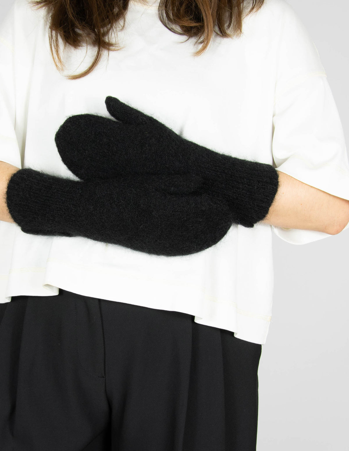Black long mohair and wool gloves by Scandinavian brand Mellowfield.