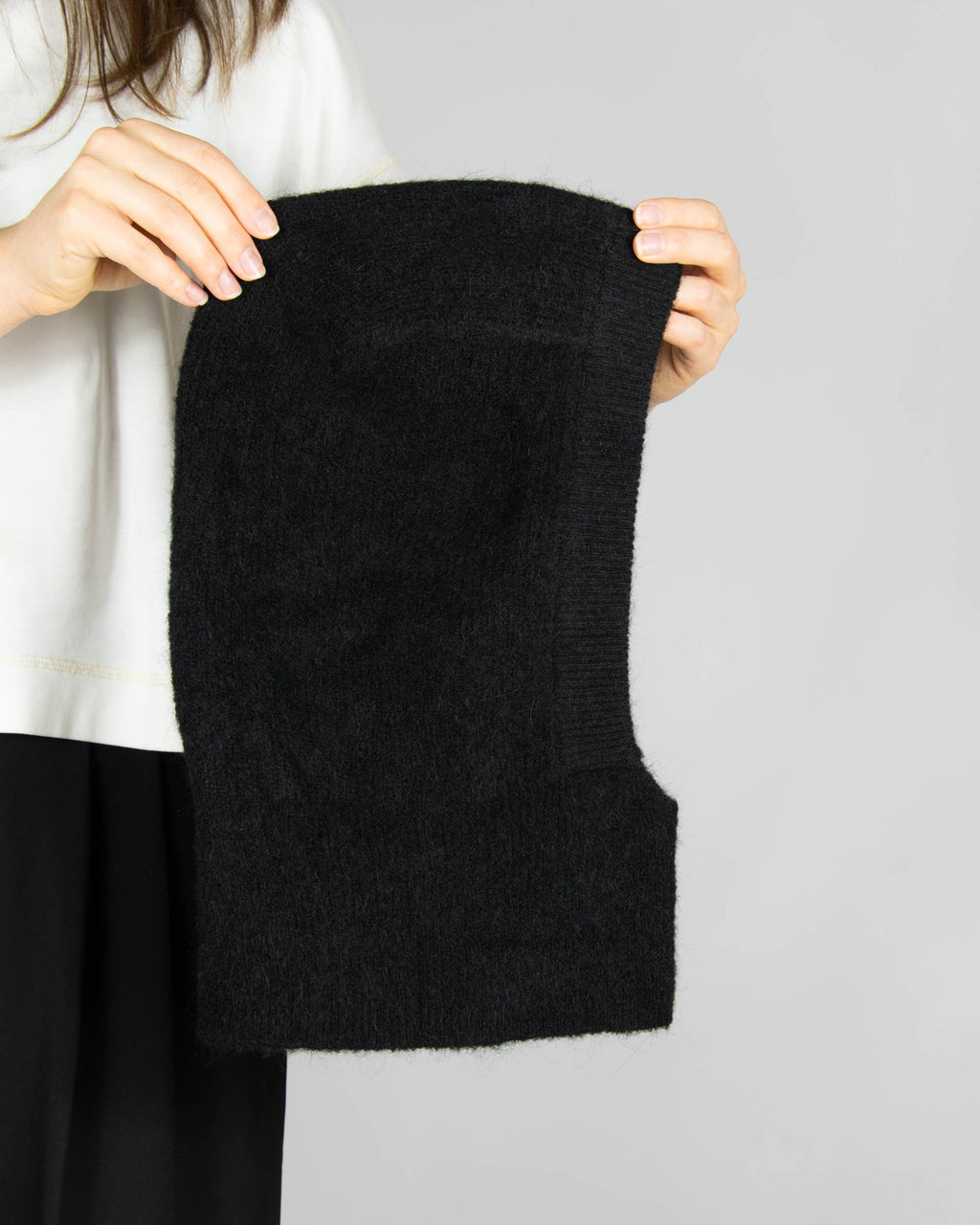 Black alpaca and wool hood by Danish brand NORR.