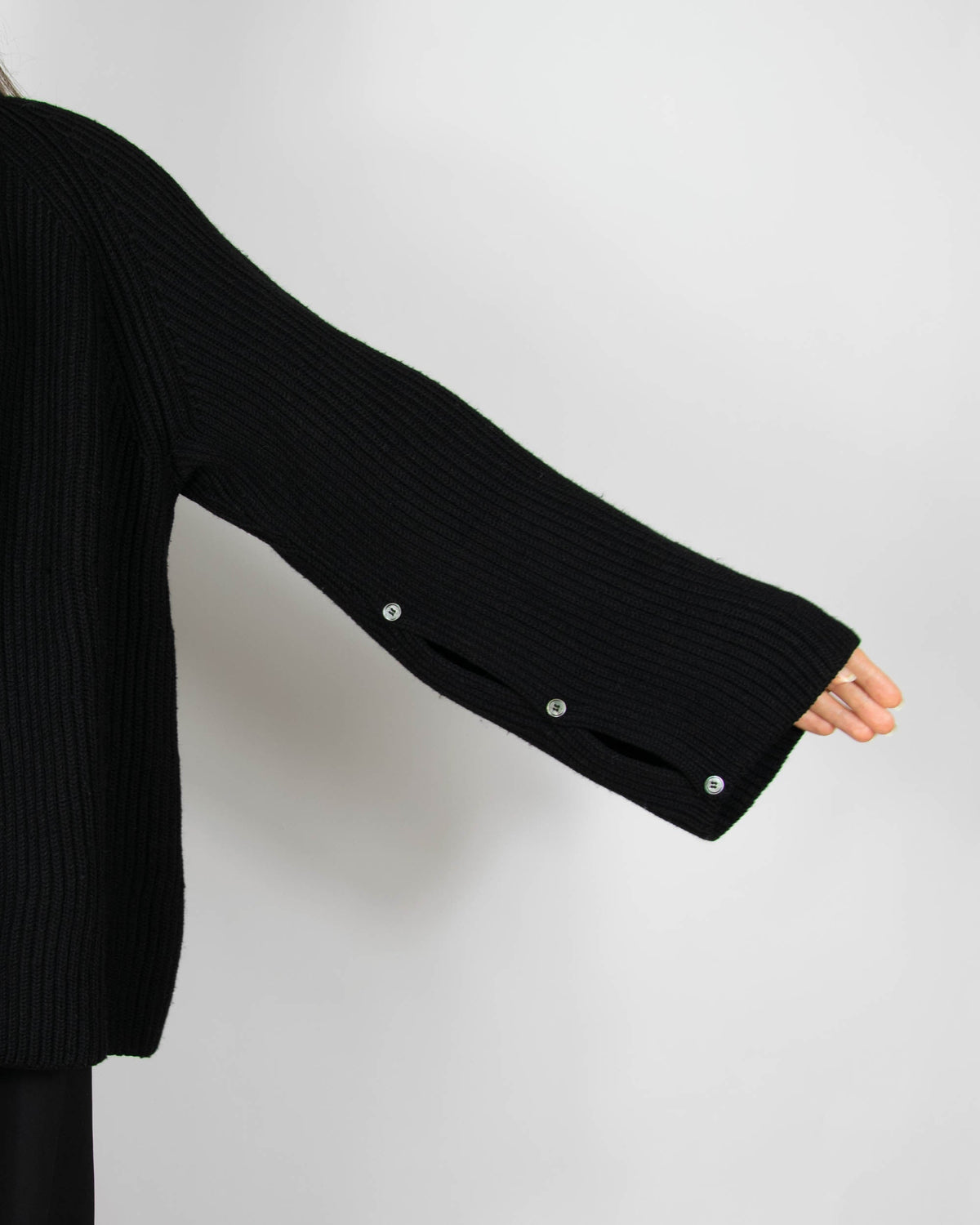 Black chunky merino wool turtleneck sweater by MKDT Studio