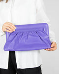 Purple leather clutch bag by GESTUZ