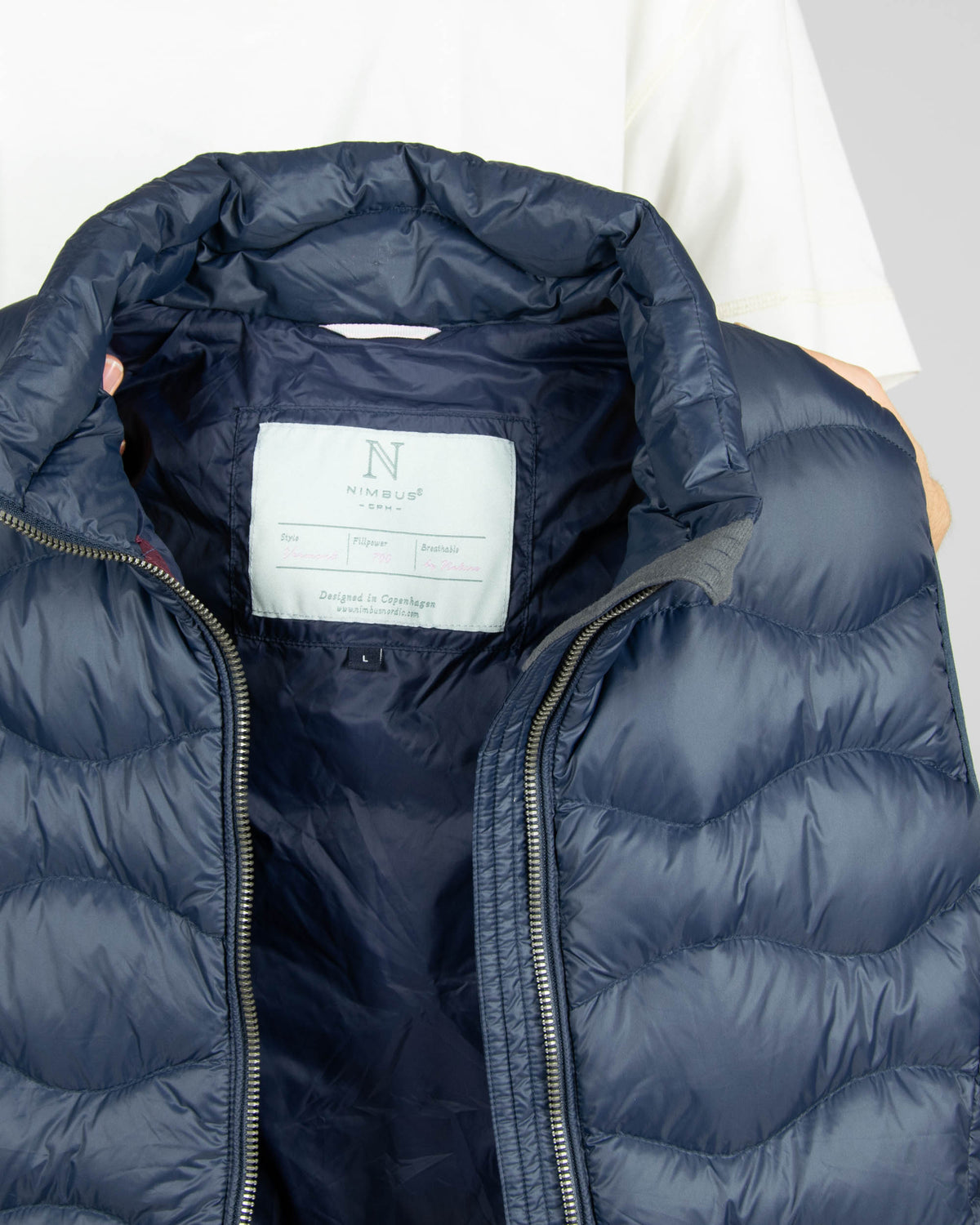 Navy women's down vest by Danish brand NIMBUS CPH