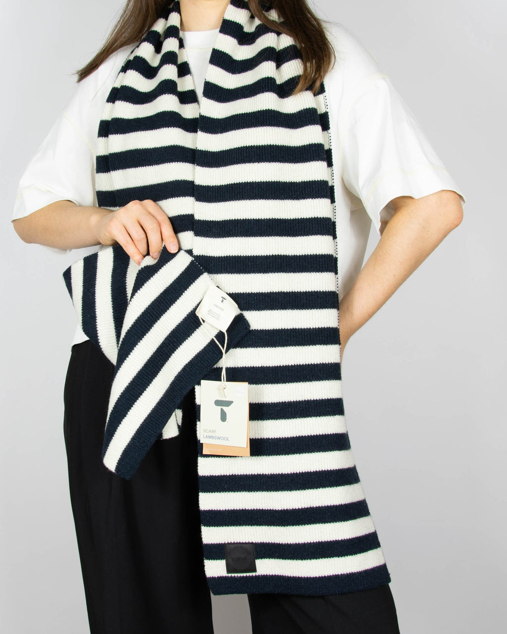 Navy and cream striped lambswool scarf by Tufte