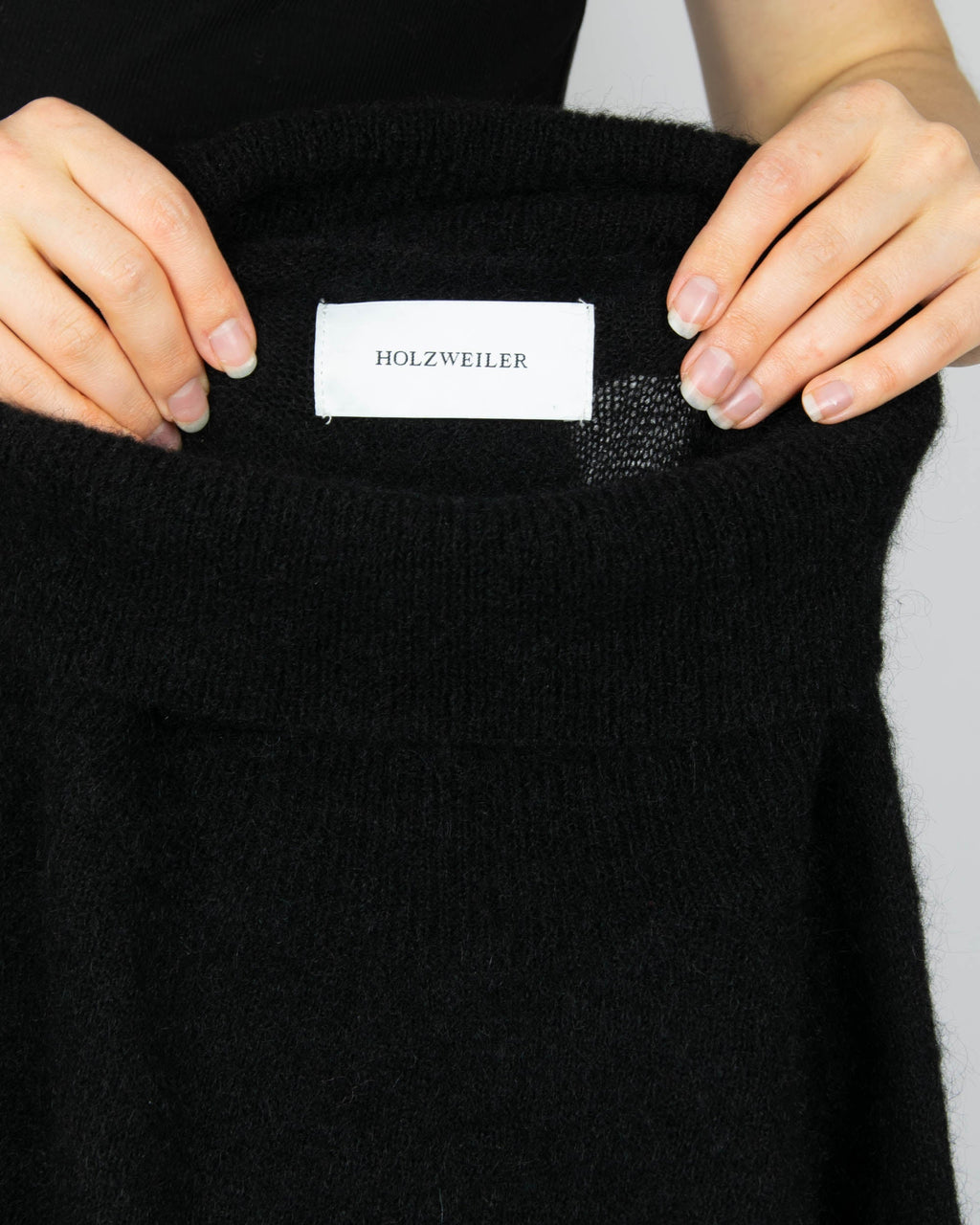 Black kid mohair and wool dress by Holzweiler