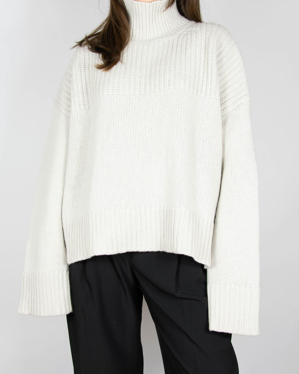 Light grey and cream chunky wool and cashmere turtleneck sweater by Italian premium brand DONDUP. Made in Italy.