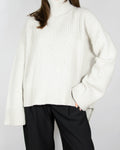 Light grey and cream chunky wool and cashmere turtleneck sweater by Italian premium brand DONDUP. Made in Italy.