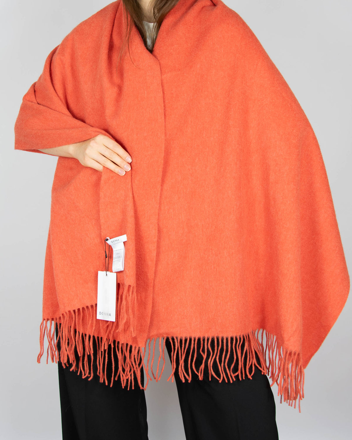 Large, cosy coral wool scarf by DONNA.