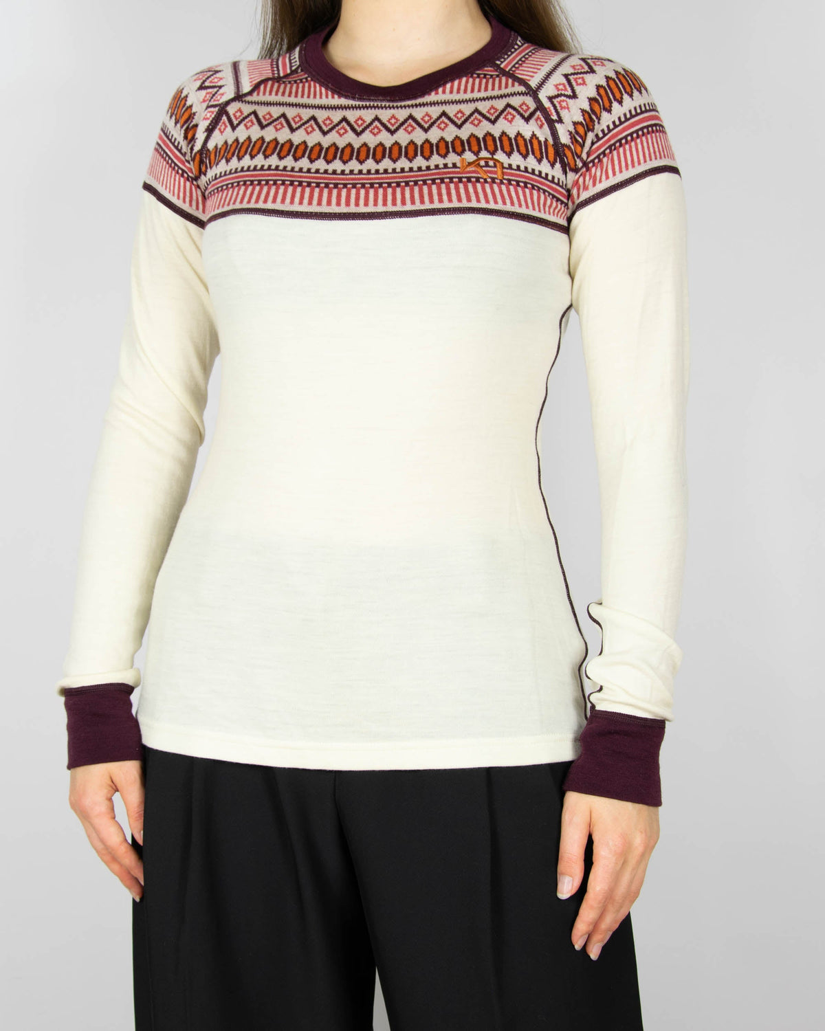 Cream and burgundy merino wool thermal top by Kari Traa