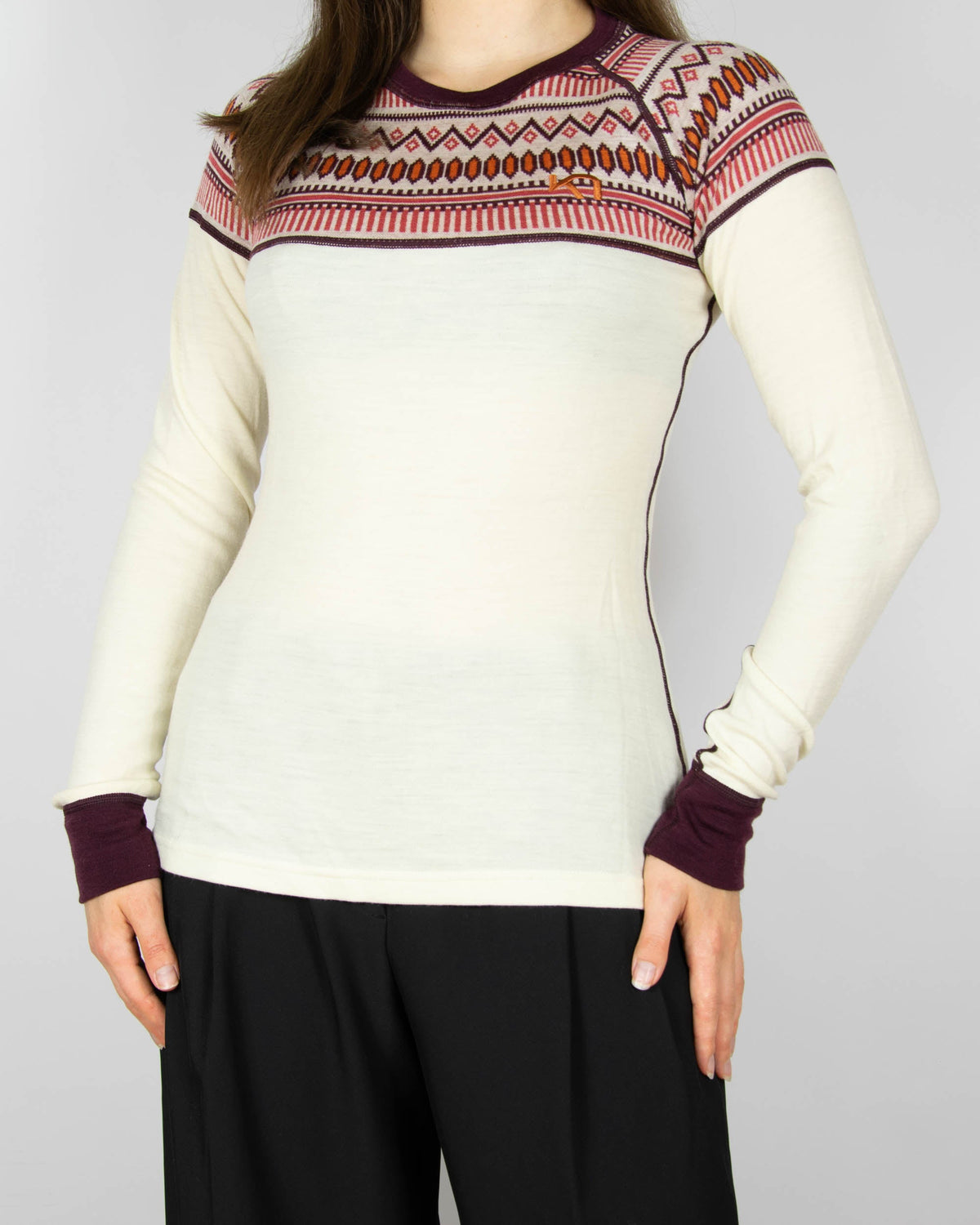Cream and burgundy merino wool thermal top by Kari Traa