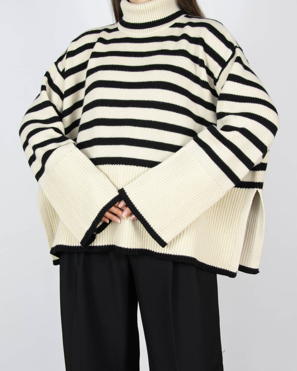 Bestselling cream and black striped wool and organic cotton sweater by Swedish premium brand Totême