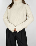 Cream wool and cashmere turtleneck sweater by H&M Premium. Soft and pleasant to the touch.