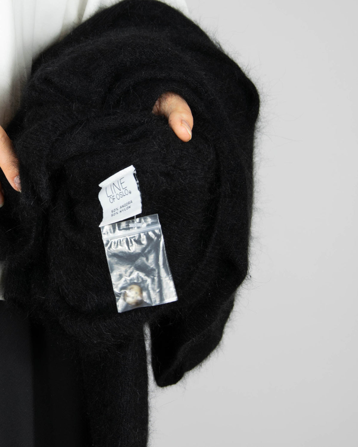 Black angora cardigan by Line of Oslo