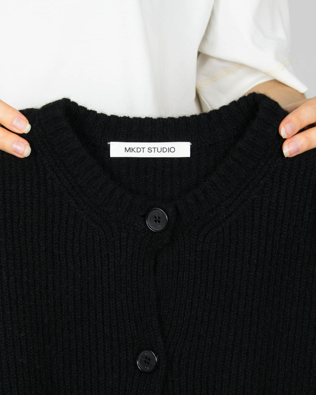 Black yak cardigan by MKDT Studio