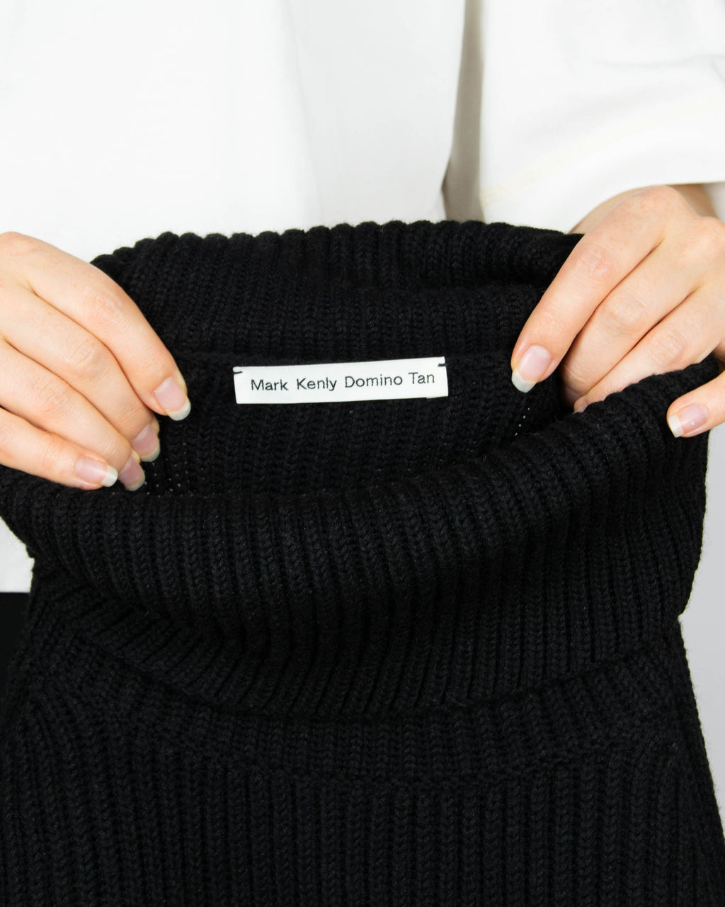 Black chunky merino wool turtleneck sweater by MKDT Studio