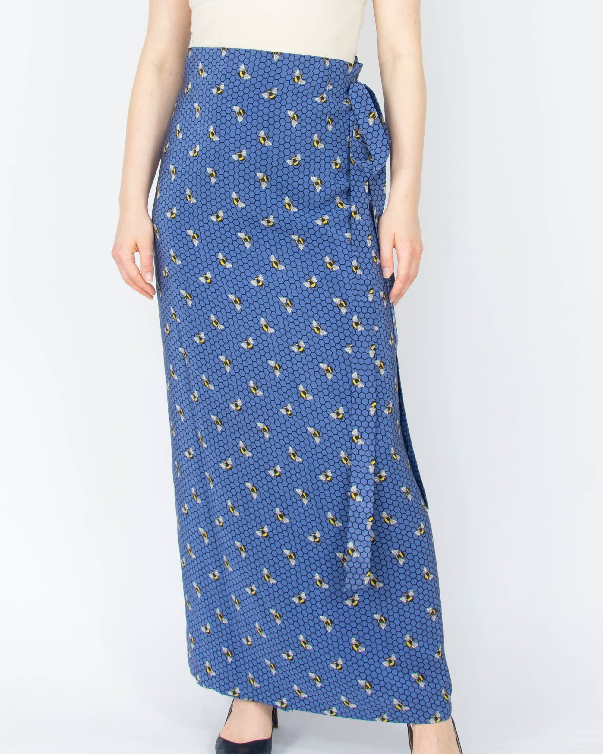 Blue silk wrap skirt with a bee print by luxury brand Charlotte Sparre