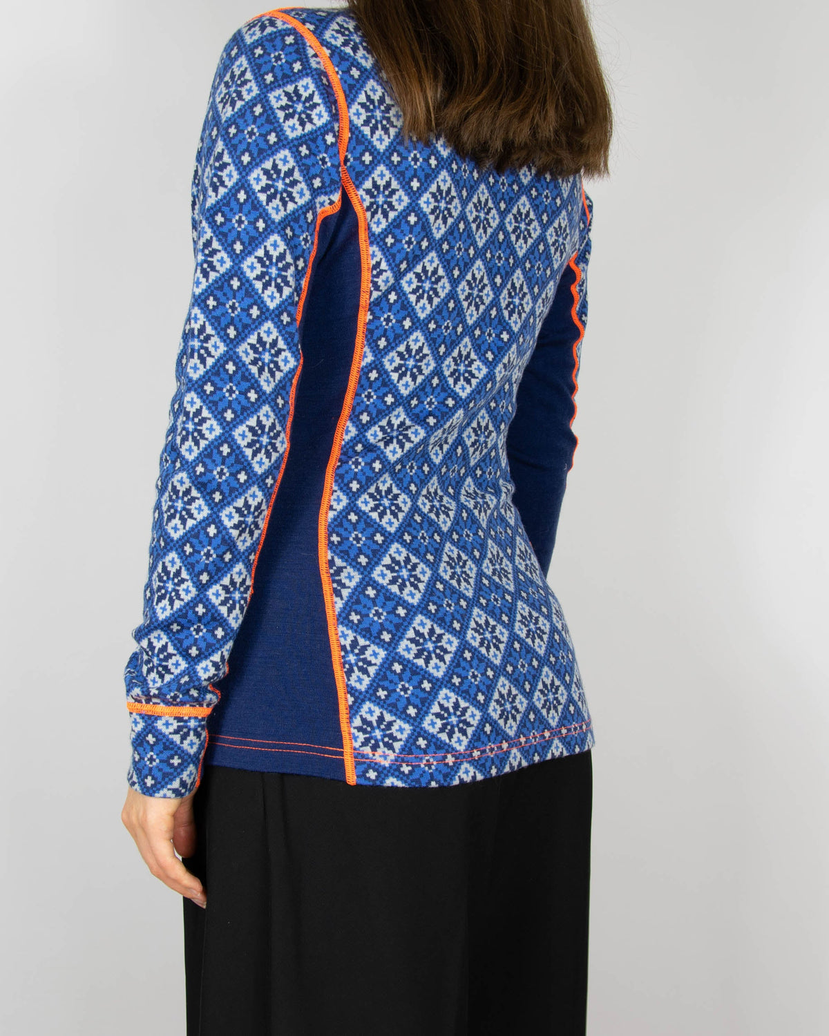 Blue merino wool thermal top by Kari Traa
