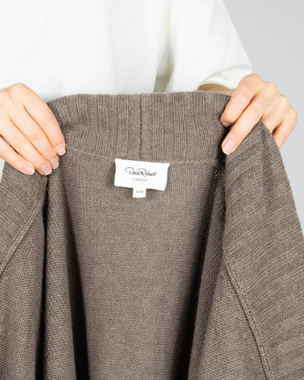 Brown tie-front merino wool cardigan by Scandinavian brand Pierre Robert.