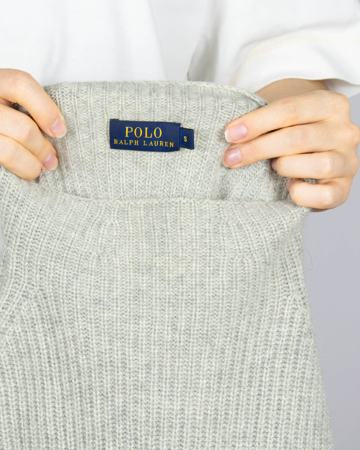 Grey wool and cashmere mock-neck sweater by premium brand Ralph Lauren.
