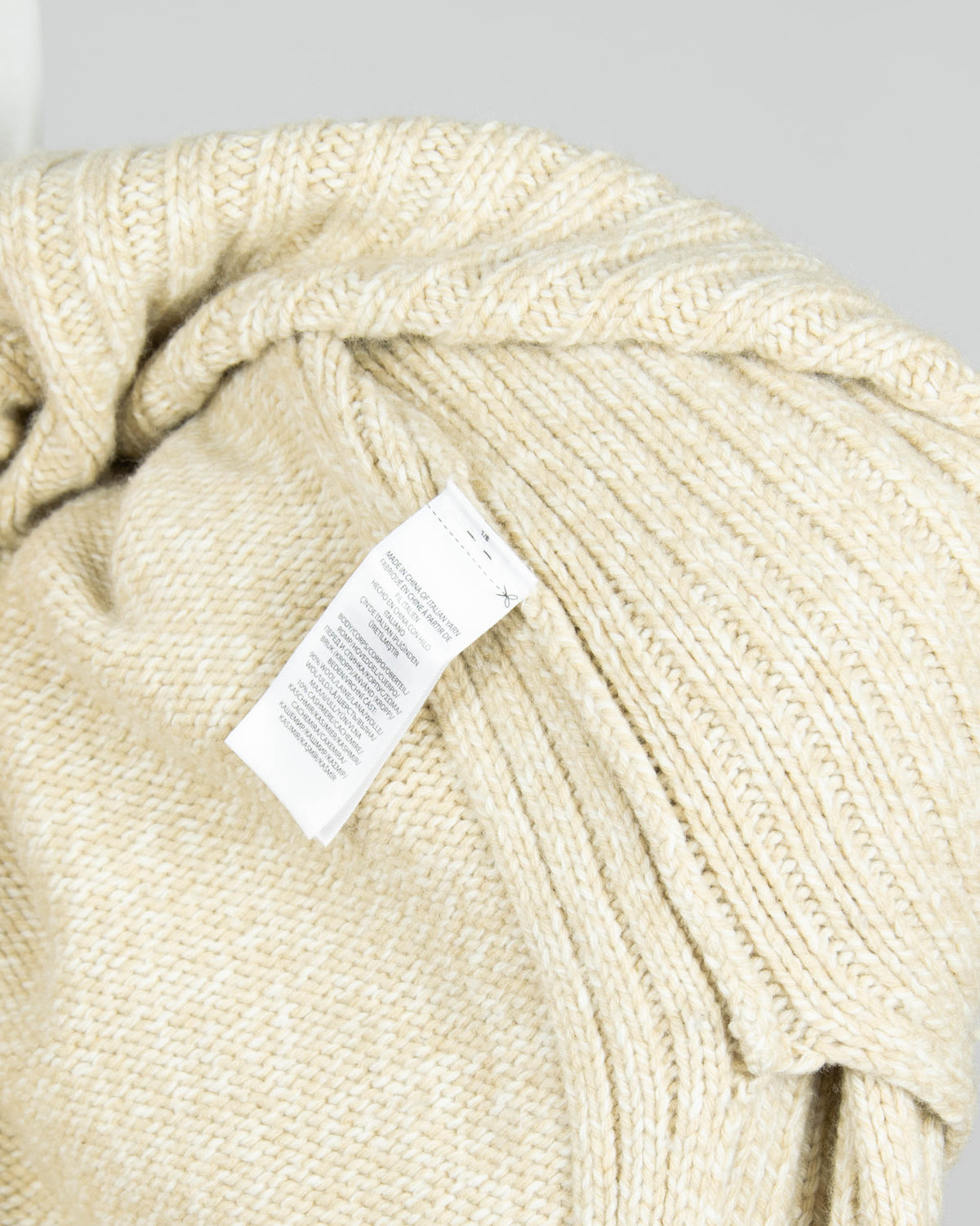 Beige chunky wool and cashmere turtleneck sweater by premium brand Ralph Lauren.