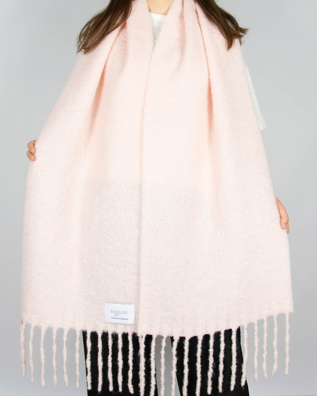 Large powder pink alpaca scarf by Norwegian luxury brand ENVELOPE 1976.