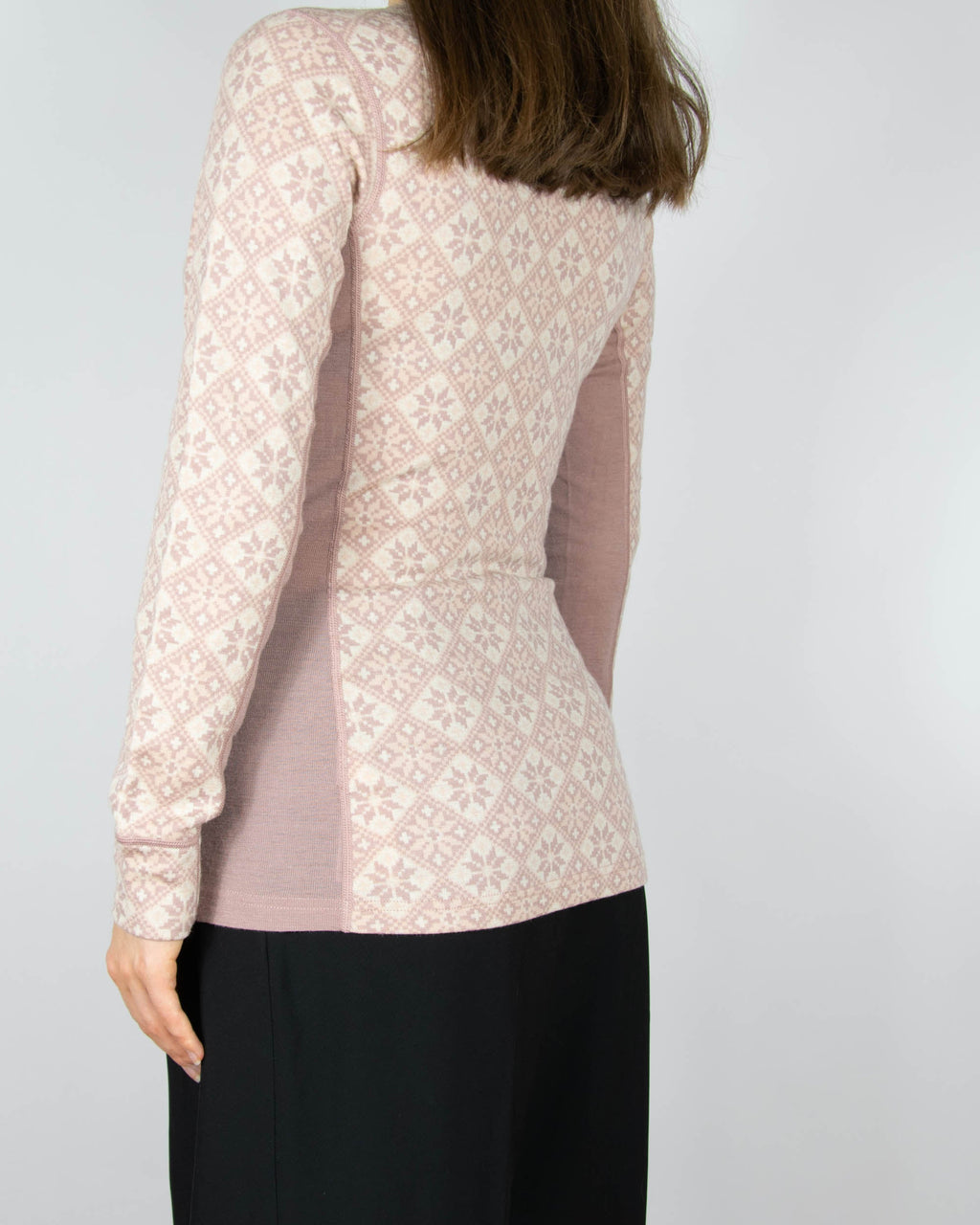 Powder pink merino wool thermal top by Kari Traa
